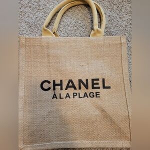 CHANEL A La Plage Beige Tote with Black Lettering